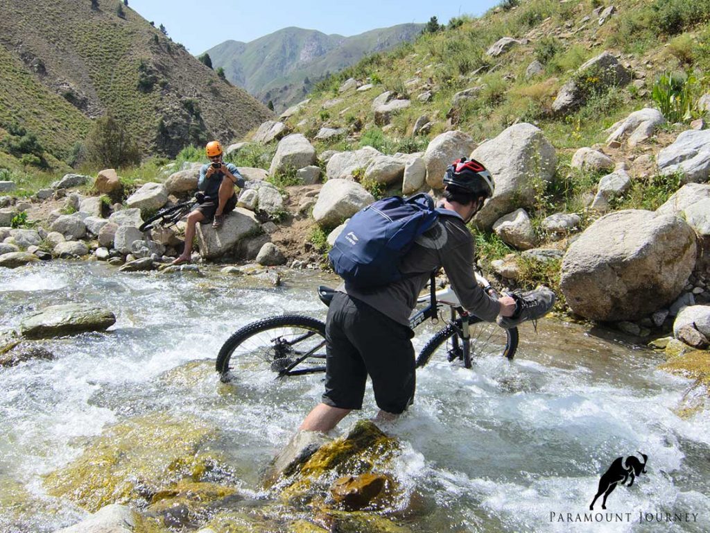 mountain bike crossing river