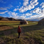Kirgyz Nomadic girl and Yurts in Alichur Valley, Pamir, Tajiksitan