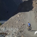 Cyclist in Bartang valley, Pamir highway,Tajikistan